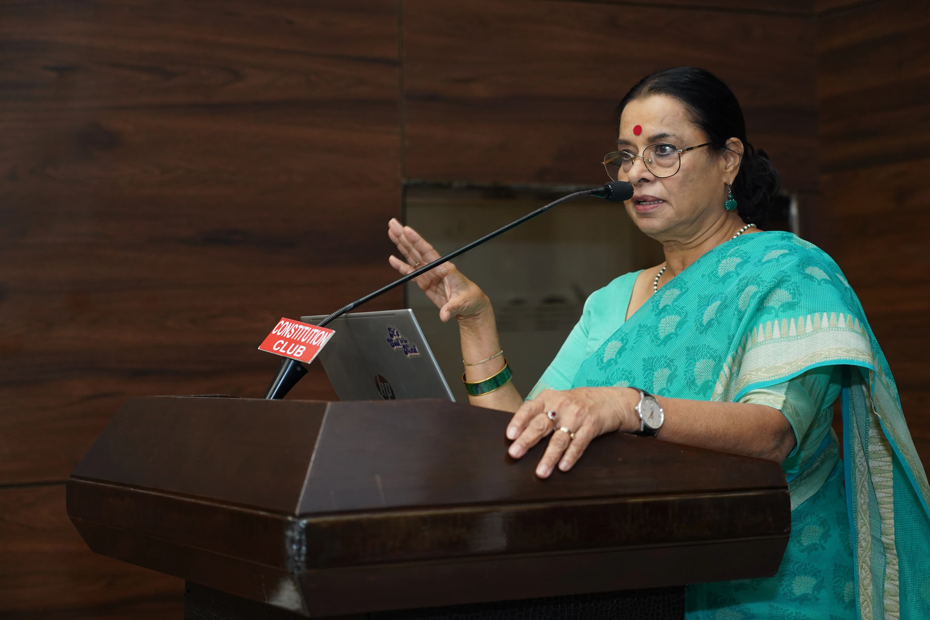 Speaker addressing the press conference before TASI 2025